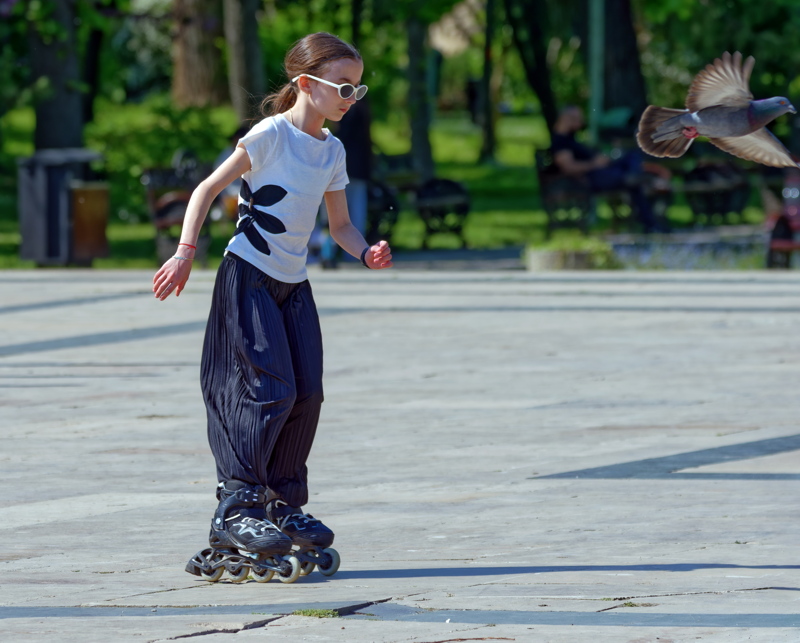 Little girl rollerblading
